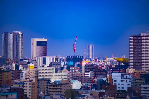 Kraanvogel boven op het gebouw in Tokio — Stockfoto