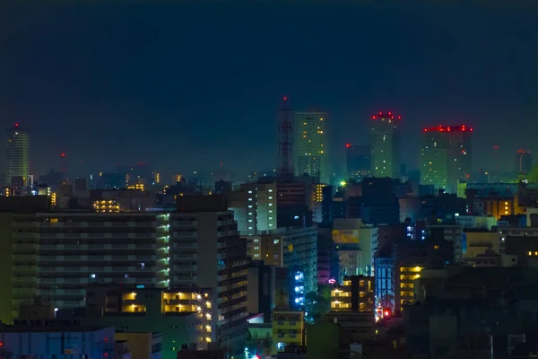 A night buildings at the urban city in Tokyo wide shot — 스톡 사진