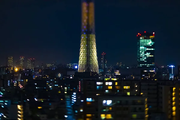 Een avond Tokio lucht boom bij de stedelijke stad in Tokio tiltshift — Stockfoto