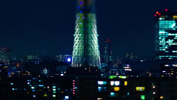 Ein nächtlicher Zeitraffer des Tokyohimmelbaums in der städtischen Stadt im Tokyotiltshift-Zoom — Stockvideo