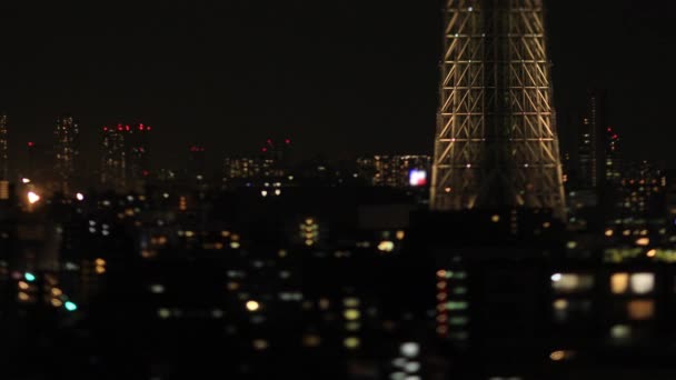 Uma miniatura noturna Tóquio céu árvore na cidade urbana de Tóquio tiro longo tiltshift — Vídeo de Stock