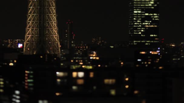 Uma miniatura noturna Tóquio céu árvore na cidade urbana de Tóquio tiro longo tiltshift — Vídeo de Stock