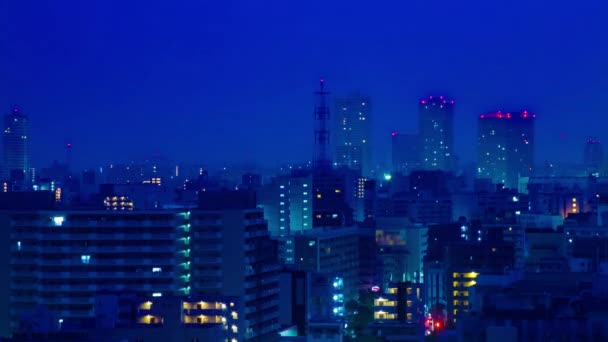 東京・都心街の夜明けのタイムラプス高角度ロングショット — ストック動画