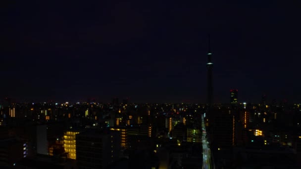 Рассвет времени на городской улице в Токио высокий угол широкий выстрел зум — стоковое видео