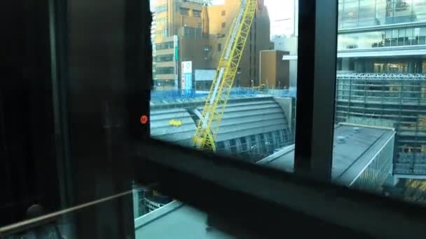 Een stad landschap van dalende lift op de stedelijke stad in Tokio hoge hoek — Stockvideo