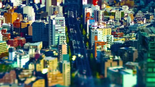 Uma timelapse da paisagem urbana em miniatura na cidade urbana de Tóquio, inclinação de alto ângulo panning — Vídeo de Stock