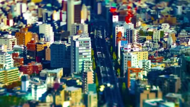 Un timelapse de paisaje urbano en miniatura en la ciudad urbana de Tokio zoom de desplazamiento basculante de ángulo alto — Vídeos de Stock