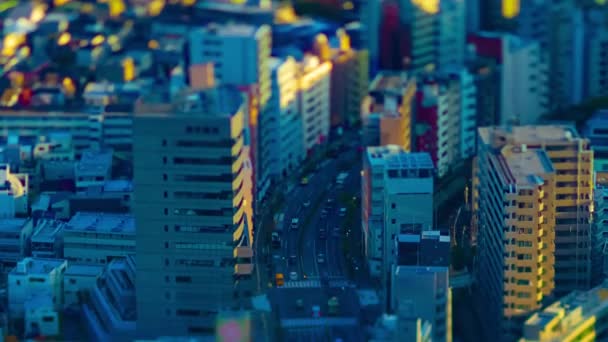 Un timelapse de paisaje urbano en miniatura en la ciudad urbana de Tokio zoom de desplazamiento basculante de ángulo alto — Vídeo de stock