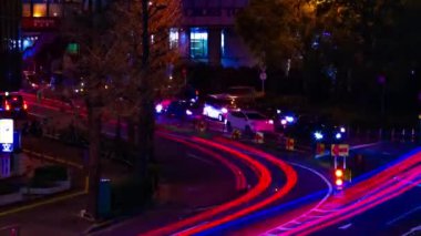 Shibuya Tokyo şehir merkezindeki neon sokağında bir gece vakti.