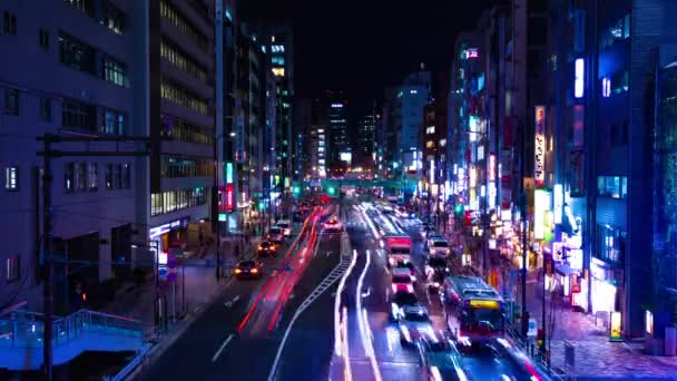 Un timelapse noche de la calle de neón en el centro de Shibuya Tokio tiro de par en par — Vídeos de Stock