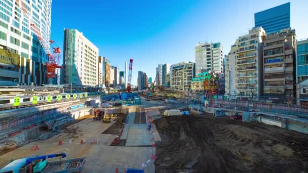 Timelapse ruchomych żurawi na budowie w Shibuya Tokio szerokie ujęcie — Wideo stockowe