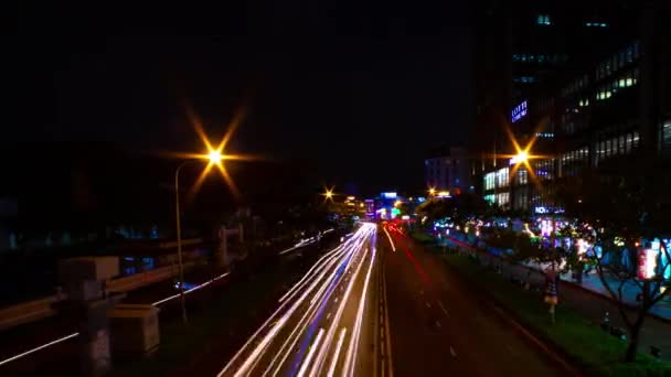 Нічний таймелапс неонової вулиці в центрі міста Хо Ши Мін В'єтнаму широкий постріл панорама — стокове відео
