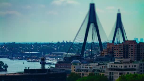 A timelapse of miniature traffic jam at Anzac bridge in Sydney high angle tiltshift tilting — Stock Video