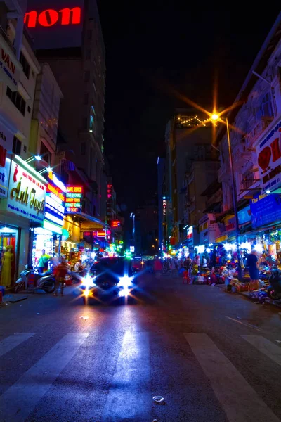 A night neon street at Ben Thanh market in Ho Chi Minh Vietnam wide shot — Stock Photo, Image