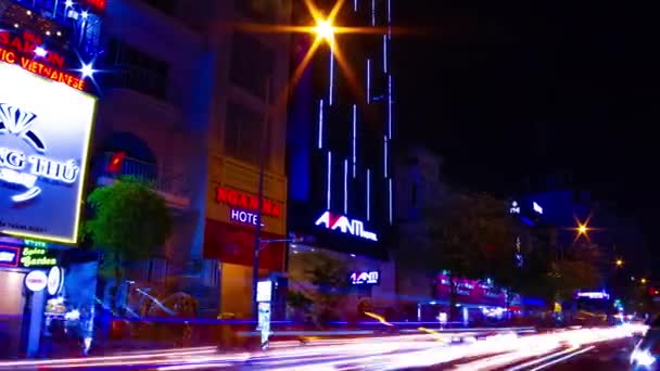 A night timelapse of the neon street at Ben Thanh market in Ho Chi Minh Vietnam wide shot panning — Stock Video