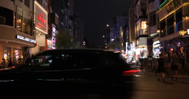 A night neon downtown at Bui Vien street in Ho Chi Minh Vietnam wide shot — Stock Video