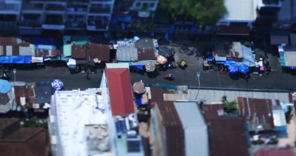 Een hoge hoek uitzicht van miniature stad landschap op de benedenstad in Ho Chi Minh overdag tiltshift — Stockvideo