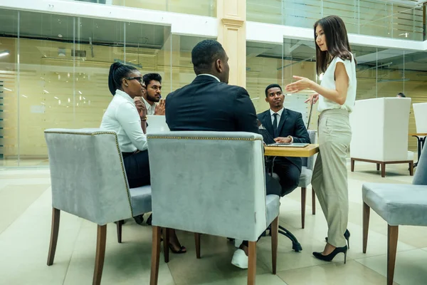 Ndian ,korean , afro-american businessman businesswoman work in modern background — Stock Photo, Image