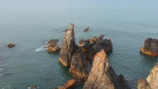 Arambol rock indian famous beach aerial top view drone shot — Stock Video