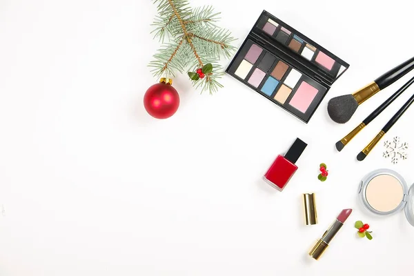 Make up set cosmetic with christmas decoration on white background flat lay — Stock Photo, Image