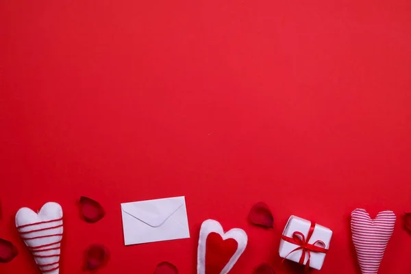 Happy Valentines day / love symbols concept on bright red background — стоковое фото