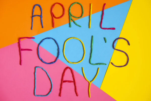 Funny font first april fools day written in plastecine of different colors. — Stock Photo, Image