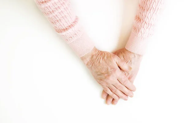Limbaj de gesturi feminin în vârstă, semne de mâini izolate pe fundal alb solid. Femeia în vârstă de șaptezeci și optzeci de ani arată antebrațe . — Fotografie, imagine de stoc