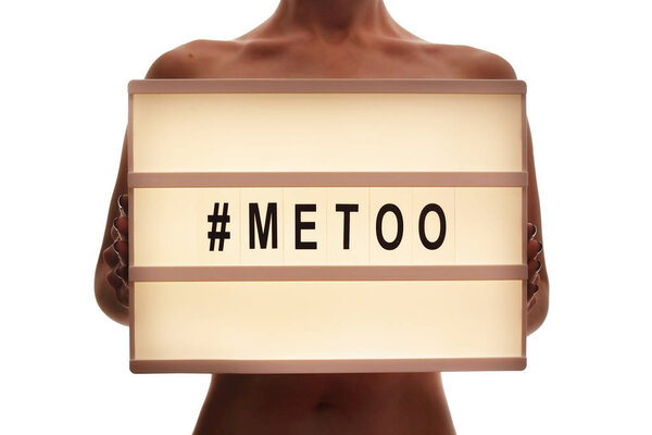 '#METOO' text in woman's hands. Female empowering movement concept.