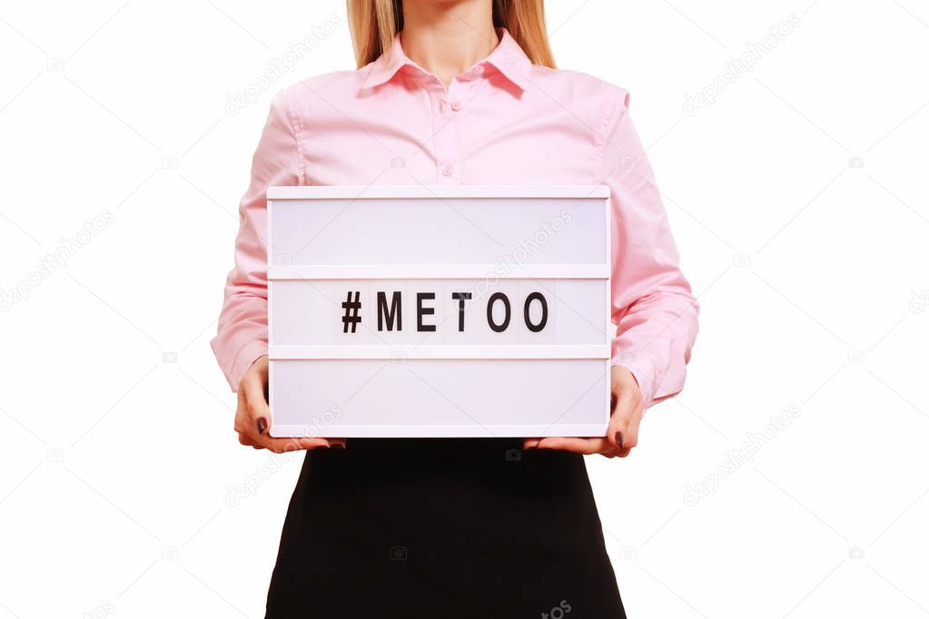 '#METOO' text in woman's hands. Female empowering movement concept.