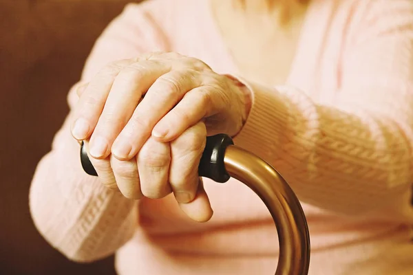 Close up of mature womans hands. Health care giving, nursing home. Parental love of grandmother. Old age related diseases. — Stock Photo, Image