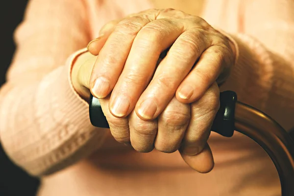 Close up of mature womans hands. Health care giving, nursing home. Parental love of grandmother. Old age related diseases. — Stock Photo, Image