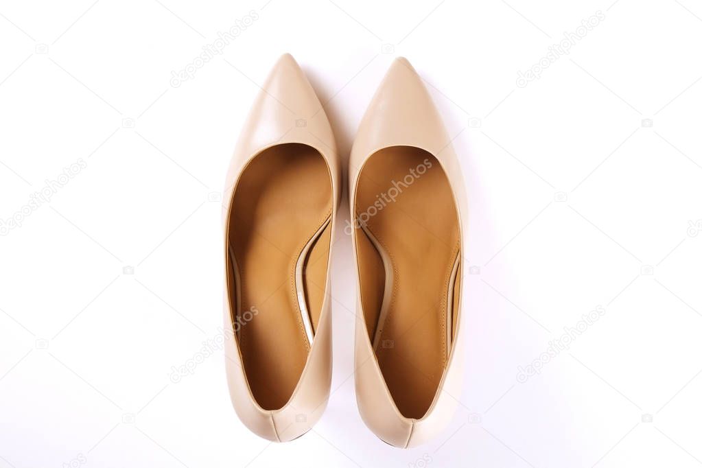 Top view of fashionable feminine medium heeled women's leather shoes of pastel colors on heels / wedge for spring-summer season.