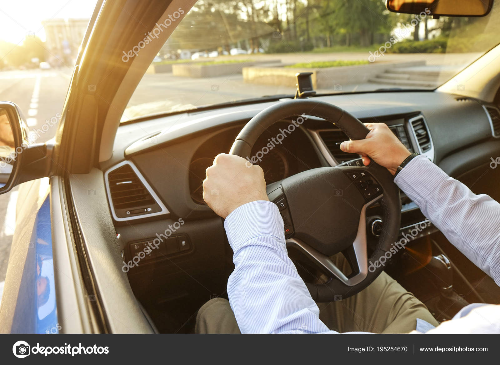 Car Interior With Male Driver Sitting Behind The Wheel Soft