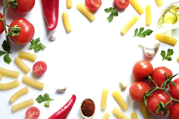 Top view of mixed vegetables on white countertop. Vegan dieting food.