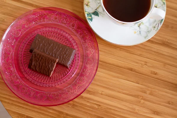 Cup of coffee and chocolate sweets — Stock Photo, Image