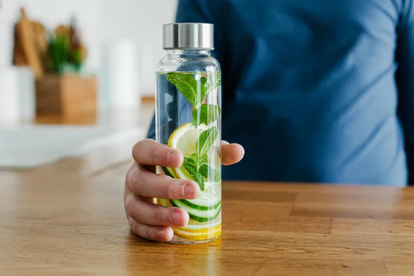 Teenager Boy Holding Glass Bottle Infused Detox Water Cucumber Lemon — Stock Photo, Image