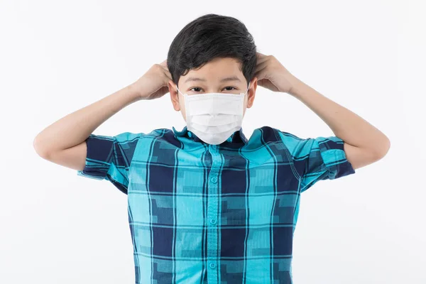 Young Little Asain Boy Holding Surgical Protective Mask Ready Demonstrate — Stock Photo, Image