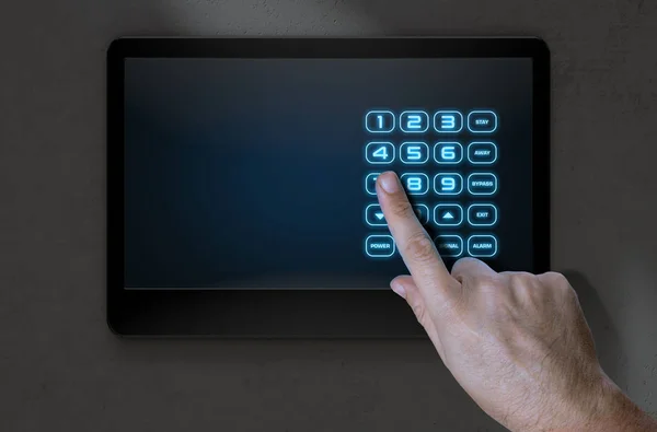 Hand dringende Modern Home Security — Stockfoto