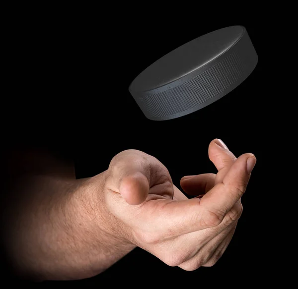 Hand Tossing Hockey Puck — Stock Photo, Image