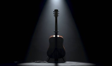 An acoustic guitar resting on a stand on a music concert stage lit by a single dramatic spotlight on a dark background - 3D render clipart