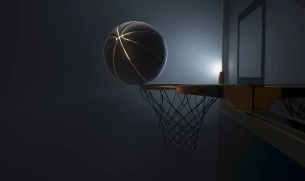 黒と金のバスケットボールのティーリングのアクションショットは 孤立した暗い背景の後ろから劇的に脚光を浴びています 3Dレンダリング — ストック写真