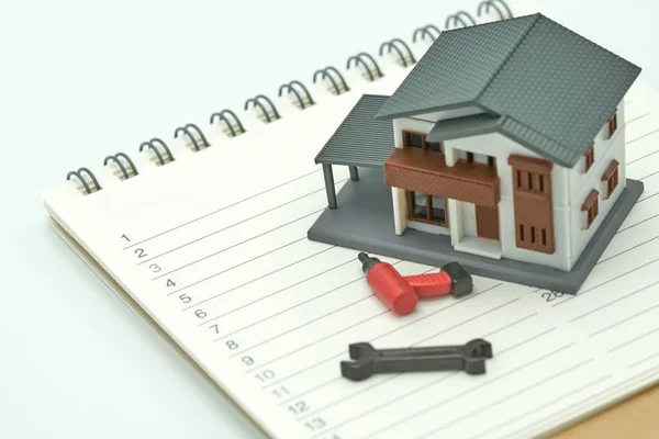Huis Apparatuur Modellen Geplaatst Een Boek Rankings Lijst Home Reparatie — Stockfoto