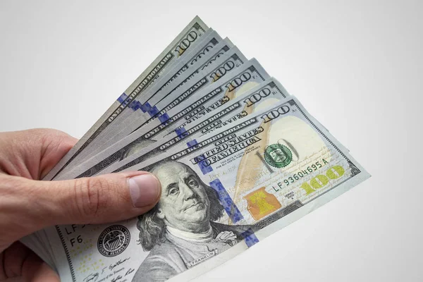 Dolar, closeup fotoğraf yüz doları bankno tutan el