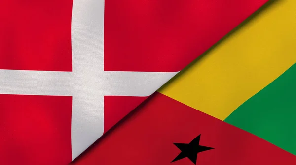 Två Stater Flaggar Danmark Och Guinea Bissau Hög Kvalitet Affärsbakgrund — Stockfoto