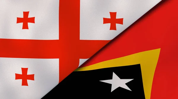 Twee Vlaggen Van Georgië Oost Timor Hoge Kwaliteit Zakelijke Achtergrond — Stockfoto