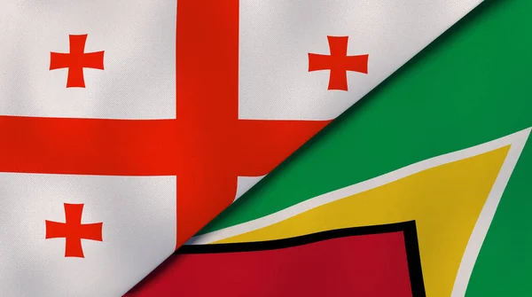 Twee Staten Vlaggen Van Georgië Guyana Hoge Kwaliteit Zakelijke Achtergrond — Stockfoto