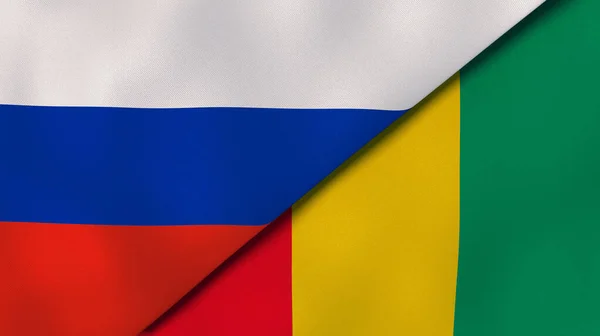 Två Stater Flaggar Ryssland Och Guinea Hög Kvalitet Affärsbakgrund Illustration — Stockfoto
