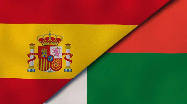 Δύο Σημαίες Της Ισπανίας Και Της Μαδαγασκάρης Επαγγελματικό Υπόβαθρο Υψηλής — Φωτογραφία Αρχείου