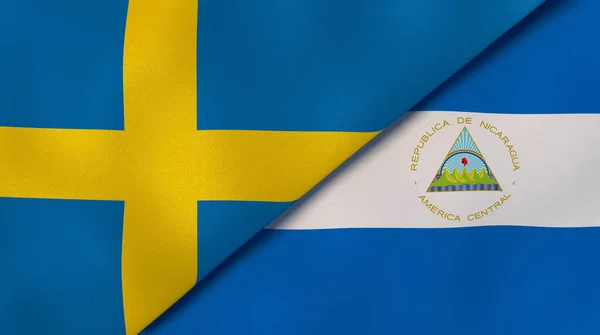 Δύο Σημαίες Κρατών Της Σουηδίας Και Της Νικαράγουας Επαγγελματικό Υπόβαθρο — Φωτογραφία Αρχείου