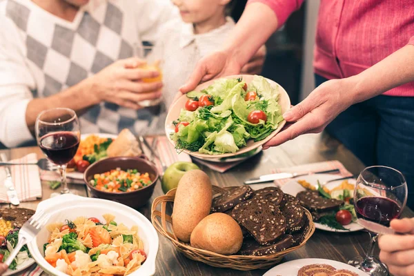 Nice family having tasty dinner